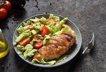 Baked chicken breast with honey and salad with cabbage and tomatoes. Healthy food, keto diet, paleo diet. Top view with copy space.