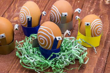 Handmade Easter egg coaster. Make your own cardboard Easter egg coaster in the shape of a snail....