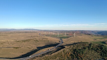 plateau du Larzac, viaduc de Millau et causses de Lozère et de l'Aveyron soleil couchant