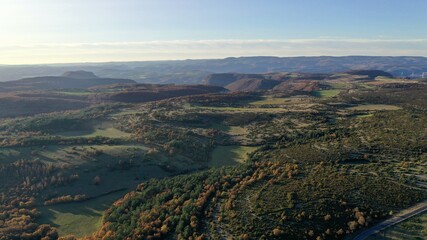 plateau du Larzac, viaduc de Millau et causses de Lozère et de l'Aveyron soleil couchant