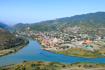 Fototapeta na wymiar Historic town of Mtskheta, Georgia showing Svetitskhoveli Cathedral and confluence of the Mtkvari (Kura) River and Aragvi River.