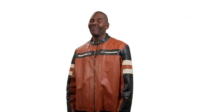 African American man, waist up, single taps the screen with on finger and smiles on white background