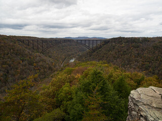 Vista of the river, mountains, and New River Gorge Bridge in the national park in West Virginia.