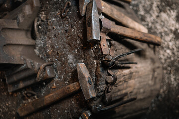 detail of an old rusty hammer and hand tools