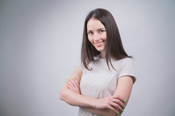 portrait of a young girl smiling on a white background