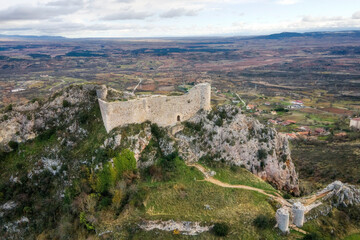 Fototapeta na wymiar Aerial view of Poza de la Sal castle and village in Burgos, Castile and Leon, Spain . High quality 4k footage
