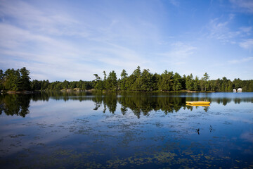 Fototapeta premium Calm lake water shot in Muskoka, Ontario Cottage Country