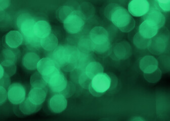 焦点がぼけた緑色の抽象的な背景 
