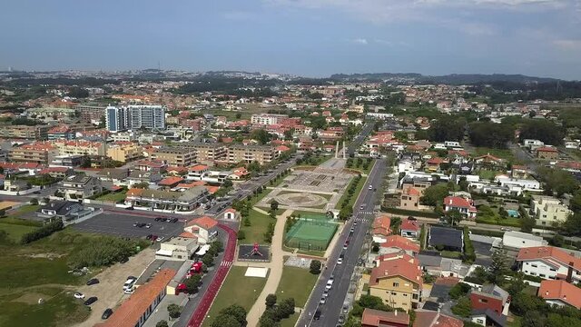 A beautiful high angle view of the Nossa Senhora da Pedra Beach and Avenue, Portugal in 4k