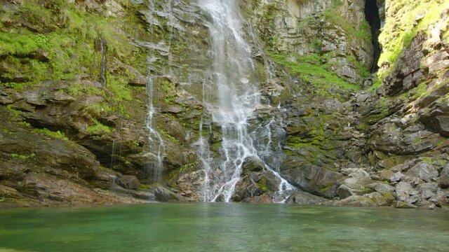 Waterfall near town Sonogno. Freezing cold waterfall. The Froda Waterfall, Verzasca Valley, Canton Ticino, Switzerland