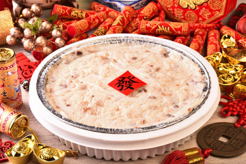 Steamed turnip cake, Chinese new year food (the Chinese words is 'make money', not a logo or trademark.)