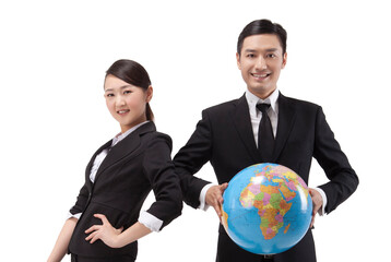 Business people holding a globe