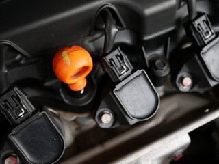 oil dipstick for check oil level in car engine room.
