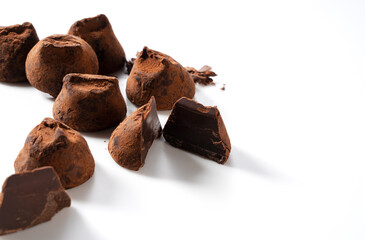 Chocolate truffles on a white background