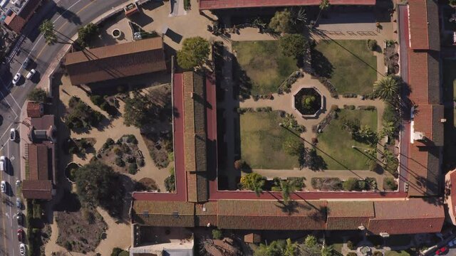 Daytime aerial view of the Spanish Colonial era mission and surrounding city of downtown San Juan Capistrano, California, USA. 
