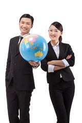 Business people holding a globe