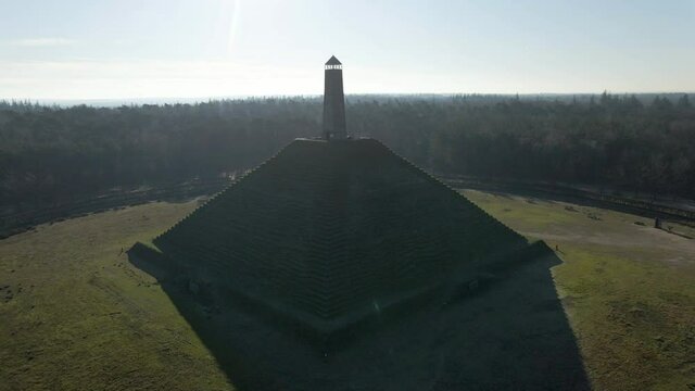 Jib up of Austerlitz Pyramid in the Netherlands on a sunny day. The Piramide van Austerlitz is a monument in the Netherlands, built in 1804 as a tribute to Napoleon Bonaparte.