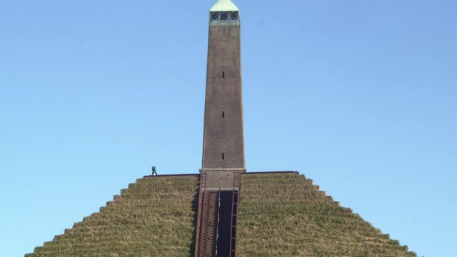 Close tilt of Austerlitz Pyramid with obelisk on top. The Piramide van Austerlitz is a monument in the Netherlands, built in 1804 as a tribute to Napoleon Bonaparte.