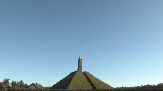 Slow tilt down of Austerlitz Pyramid - wide. The Piramide van Austerlitz is a monument in the Netherlands, built in 1804 as a tribute to Napoleon Bonaparte.