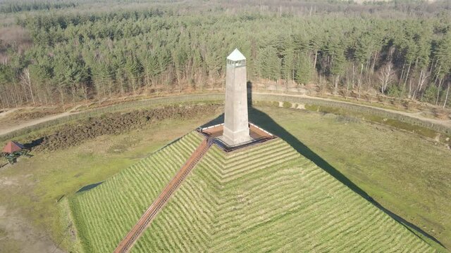 Flying away from obelisk on top of Austerlitz Pyramid. The Piramide van Austerlitz is a monument in the Netherlands, built in 1804 as a tribute to Napoleon Bonaparte.