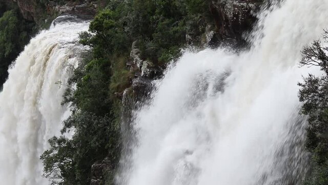 Static shot of water hitting a rock halfway down the Lisbon Falls. The Lisbon falls are the highest (94m) waterfall in Mpumalanga, South africa. Filmed with a Canon 200D on a Tripod.