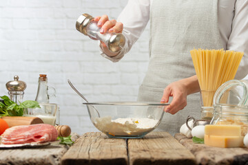 The chef prepares making baking dough, italian pasta or focache or bread.