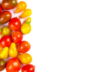 various colorful tomatoes isolated on white background