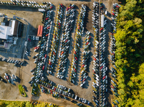 Many Used Car Auction Lot Parked Distributed In A Parking.