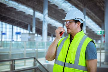 Portrait engineer under inspection and checking construction process railway and checking work on...