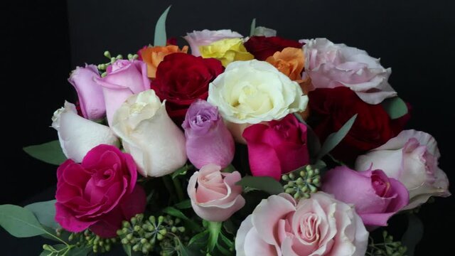 a bouquet of beautiful natural flowers and roses of different colors