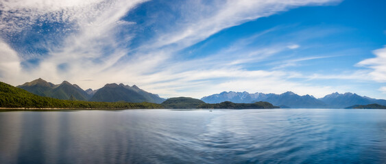 Beautiful mountain range panorama on a beautiful afternoon at Lake Te Anau in Fiordland National Park, New Zealand, South Island.
