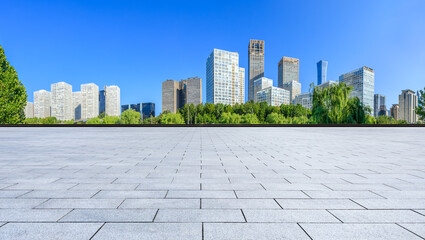 Empty square floor and modern city commercial buildings in Beijing,China.