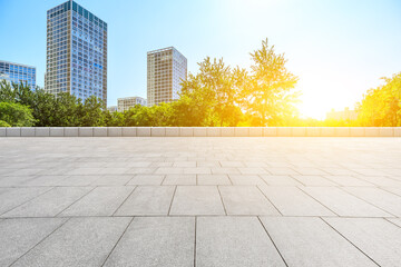 Empty square floor and modern city commercial buildings in Beijing,China.