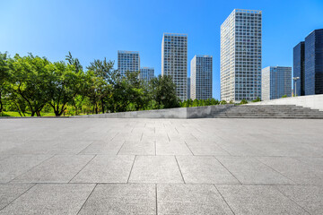 Empty square floor and modern city commercial buildings in Beijing,China.
