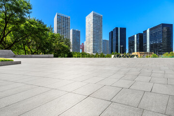 Empty square floor and modern city commercial buildings in Beijing,China.