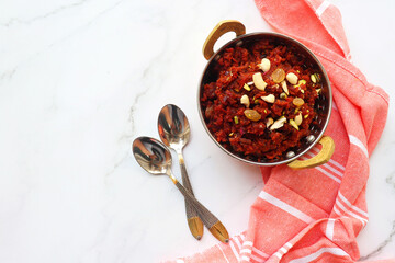  Gajar Halwa. Indian carrot pudding. It's a sweet dessert made from carrots, sugar, and cream. Garnished with cashew, almond, Raisin, and pistachio.