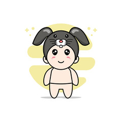 Cute baby character wearing rabbit costume.