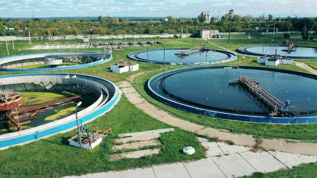 Several circular clarifiers at a large sewage treatment plant