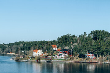 Obraz premium Spring Baltic sea landscape near Stockholm seacost. Local tourism concept, spring nature, selective focus. Sweden nature, authentic archipelago