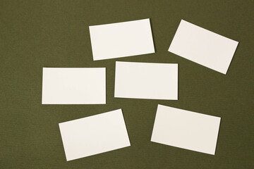 Blank card paper mockup on deep green Japanese paper for presentation
