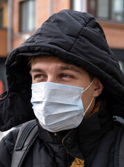 Young Man in Flu Mask