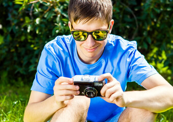 Young Man with a Photo Camera