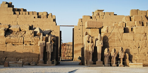 Row of statues of pharaoh at the Karnak Temple. Luxor, Egypt