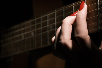 fingers on strings