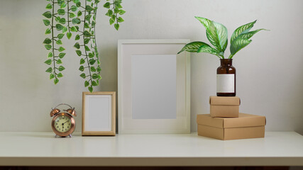 Modern home interior design in Biophilia concept with mock up frame and houseplant