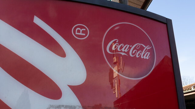 Coca Cola Sign Logo On Distributor Panel Store Of Drink Bar Machine