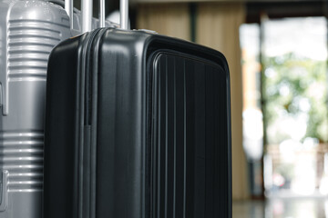 Luggage suitcase for trips standing in hotel lobby
