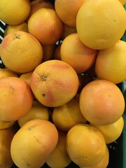 Yellow grapefruit in market place
