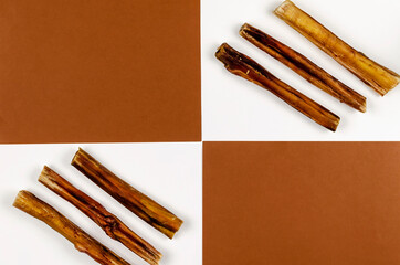 Geometric composition with Useful dried treats for pets.