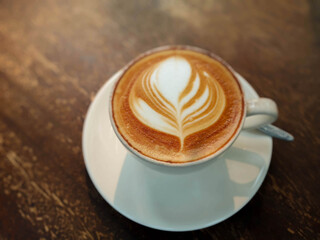 Coffee in a white mug with morning light